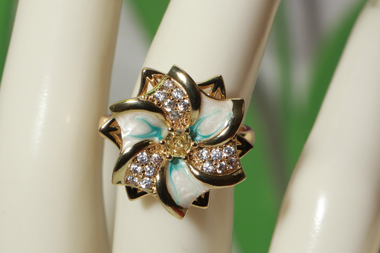 Asterials Rotating Floral Statement Ring – Gold-Tone Enamel Design