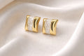 Ivory Wave Gold Stud Earrings